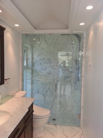 floor to ceiling glass shower surround